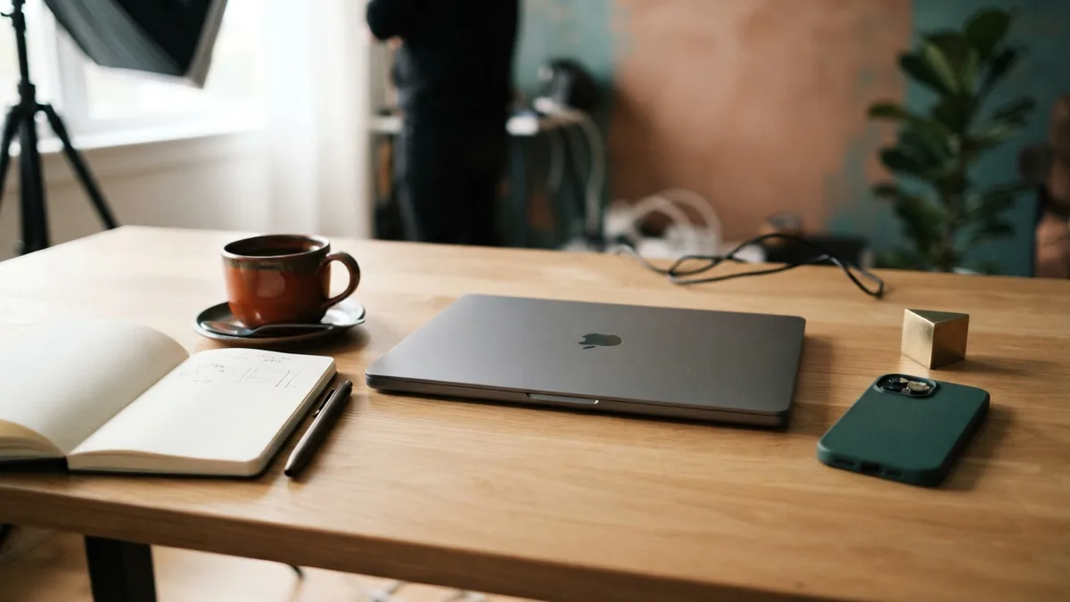 Social media and personal branding Phone and notebook on a desk for planning a thoughtful social media presence